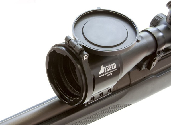 Präzise Jagen Flip-Cover Klein, Cover ist an einem Adapter am Zielfernrohr befestigt und geöffnet